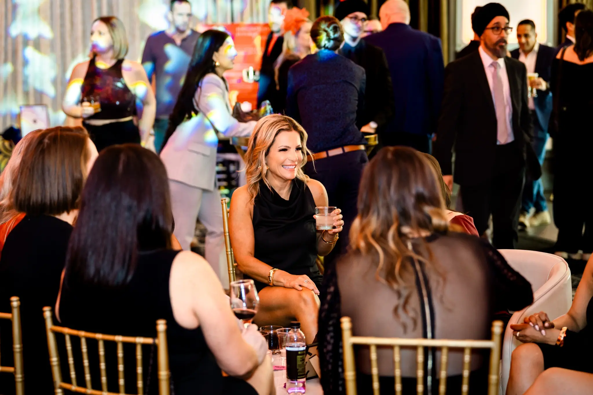 Guests socializing at a professionally photographed evening reception