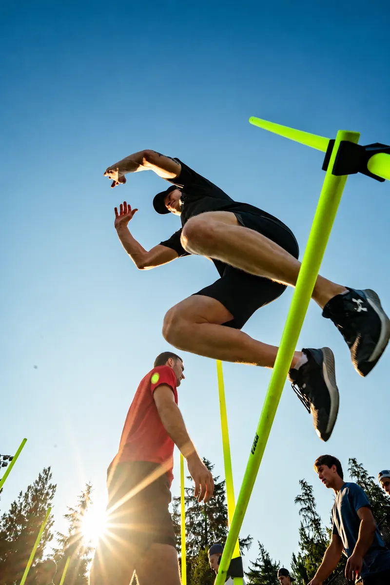 Athlete clearing a training hurdle